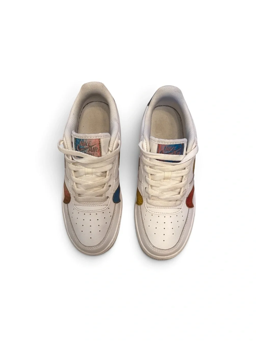 Nike Kids White Sneakers with Multicolor Swoosh Accents
